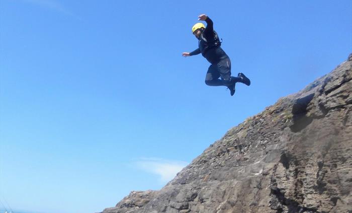 Coasteering close to Cardiff and Swansea on the South Wales Coastline, amazing cliff faces, stunning seas, jumps, caves, surges, wild swimming fantast